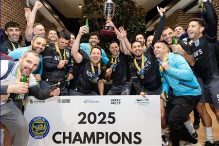 a group of people standing in front of a crowd