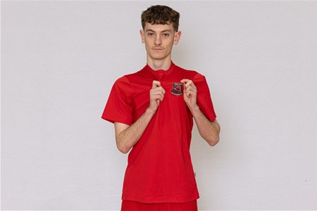 a person standing posing for the camera