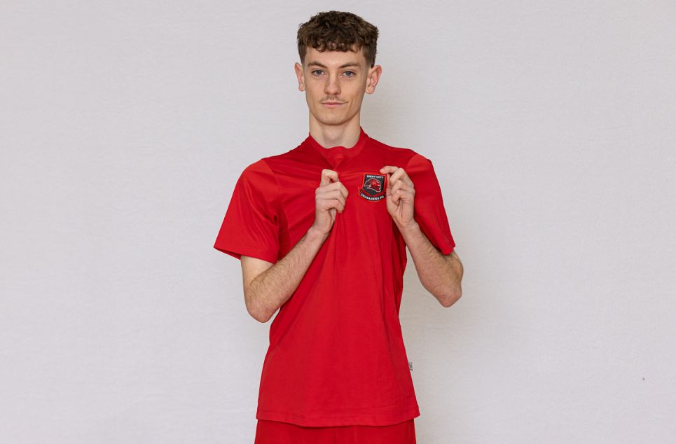 a person standing posing for the camera