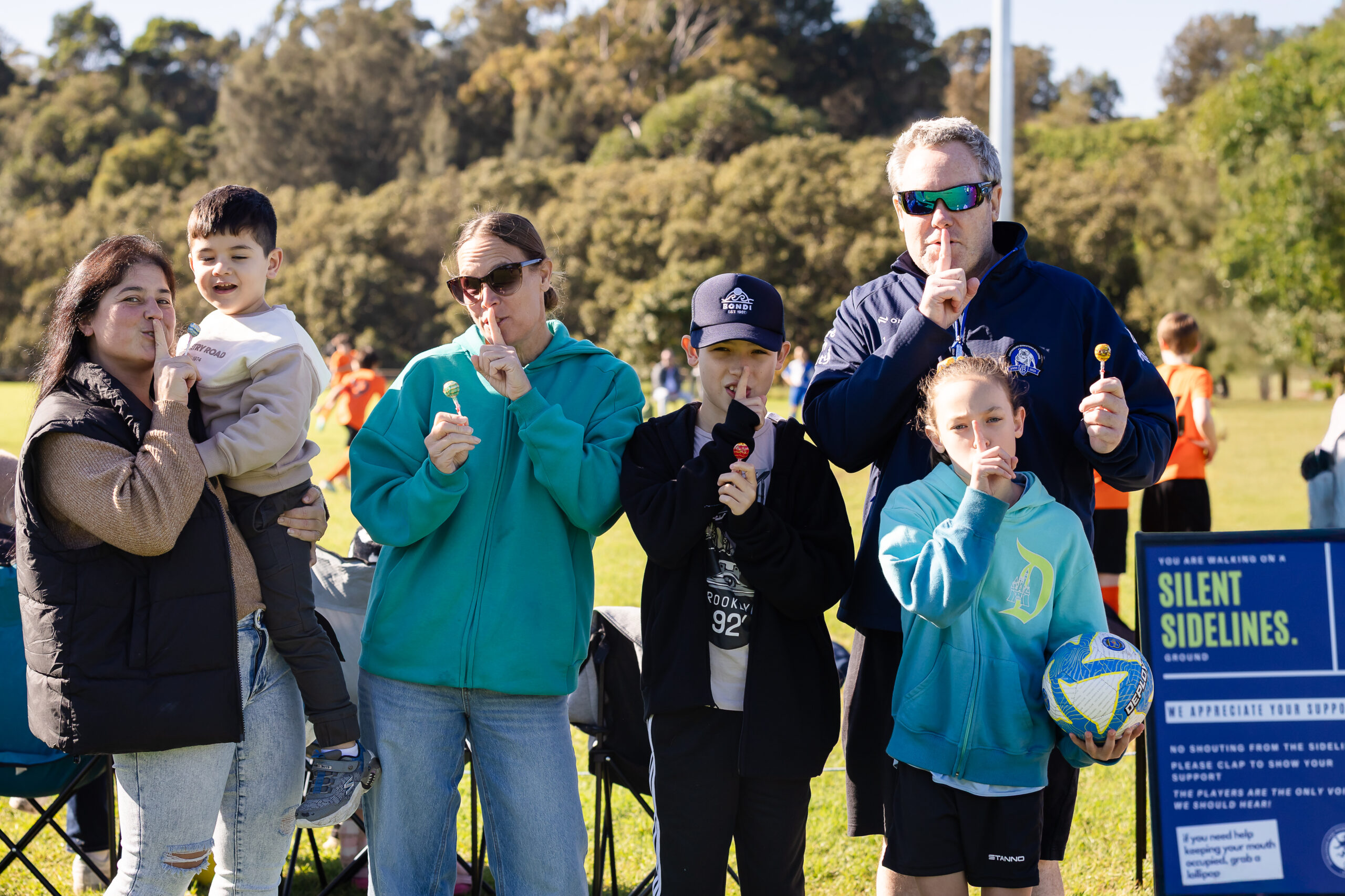 a group of people posing for the camera