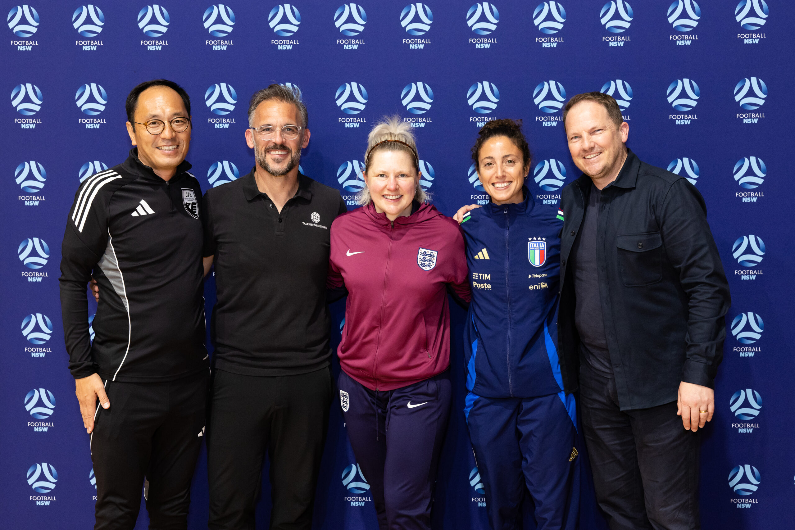 a group of people posing for a photo