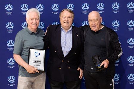 a group of people posing for the camera