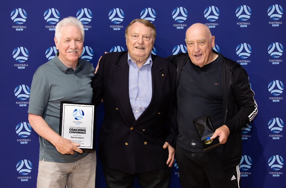 a group of people posing for the camera