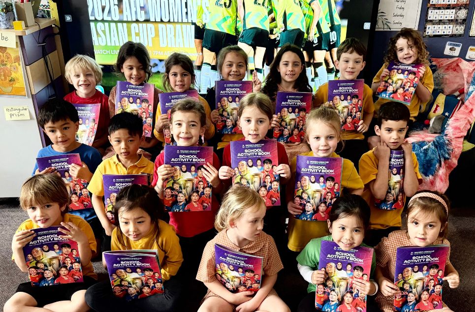 a group of kids posing for a photo