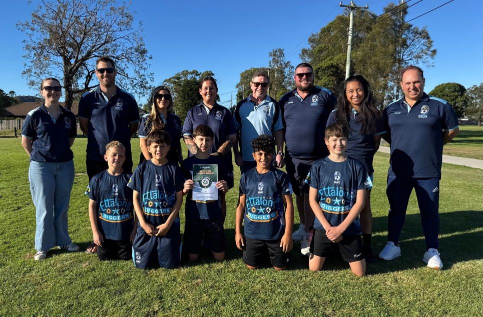 a group of people posing for a photo