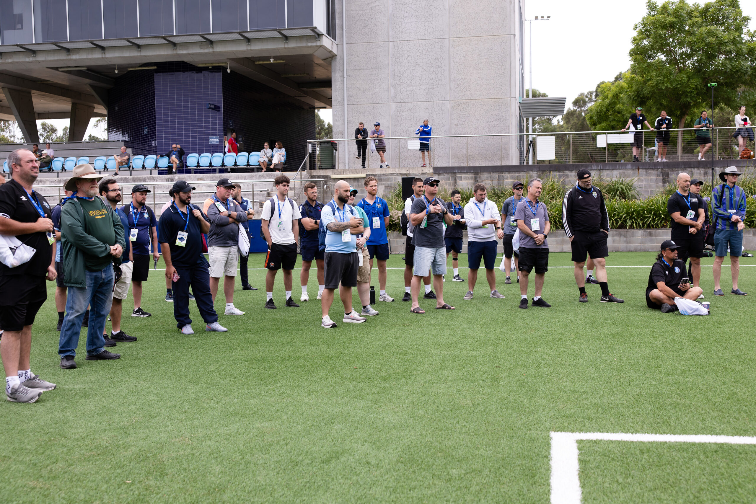 a group of people playing football on a field