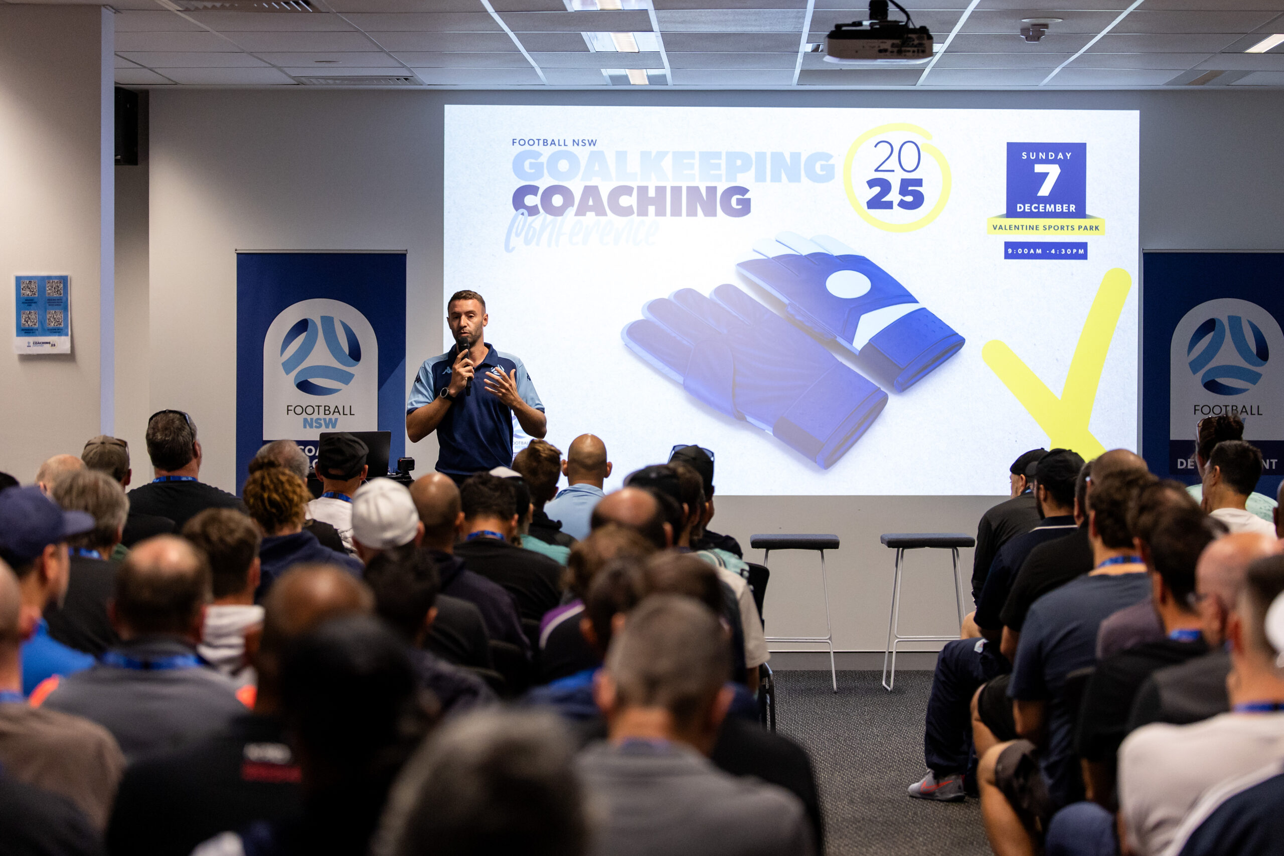 a group of people standing in front of a crowd