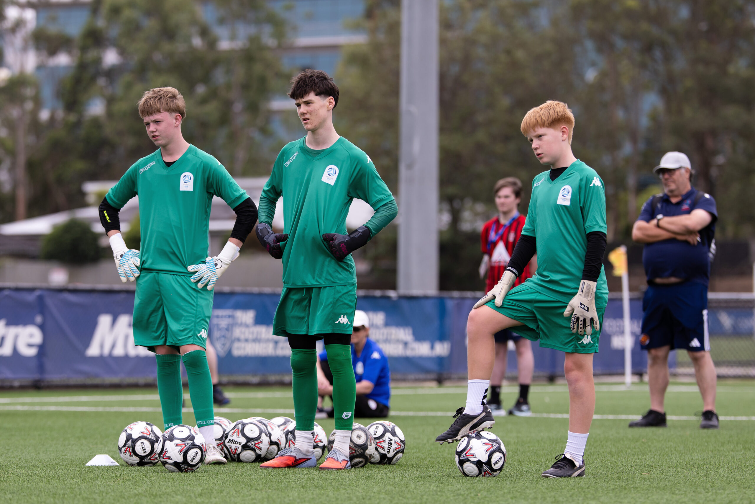 a group of young men playing a game of football