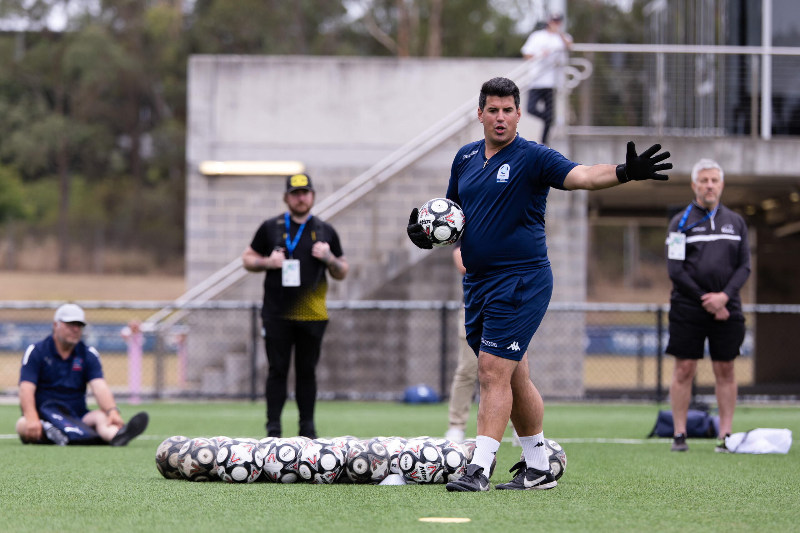 a group of people playing a game of football