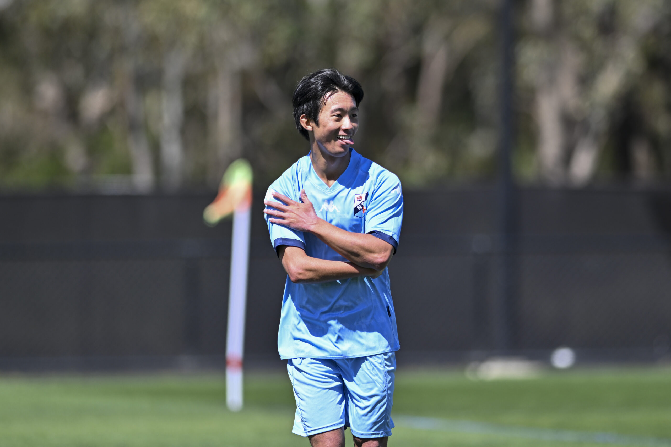 a man holding a football ball