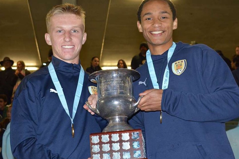 a group of people posing for the camera