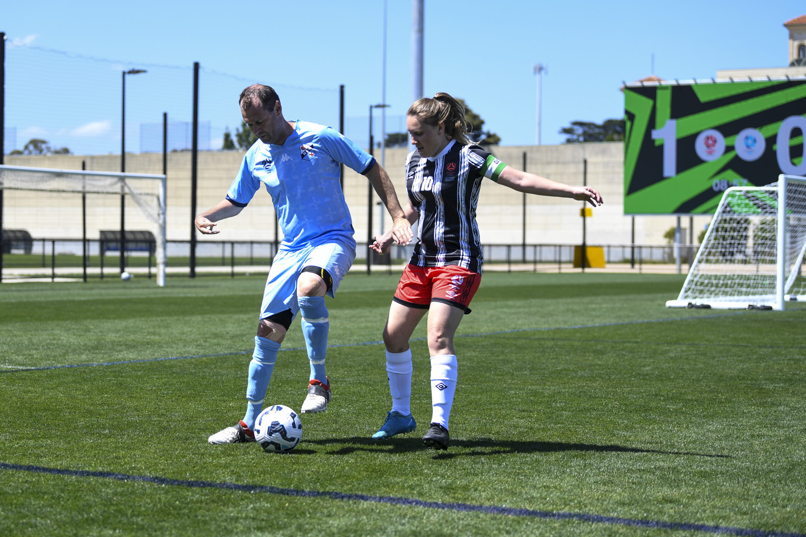 a group of young men playing a game of football