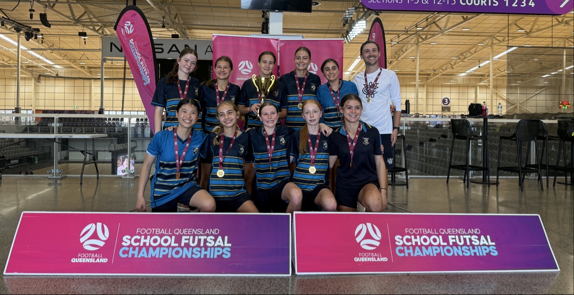 a group of people posing for the camera