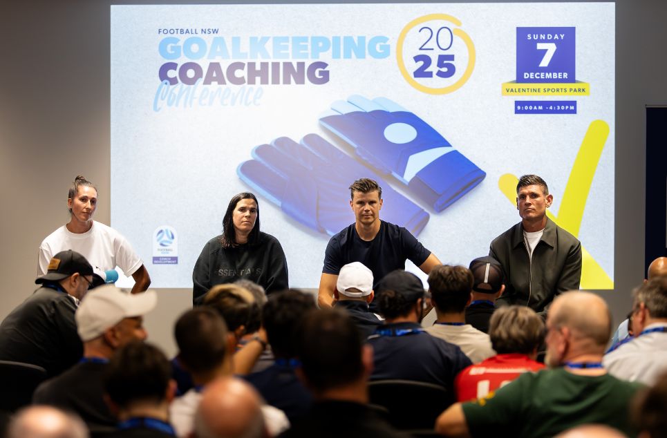 a group of people standing in front of a crowd