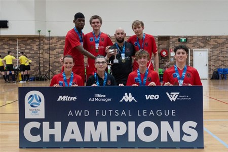 a group of people standing in front of a sign