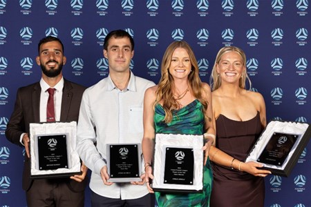 a group of people posing for a photo