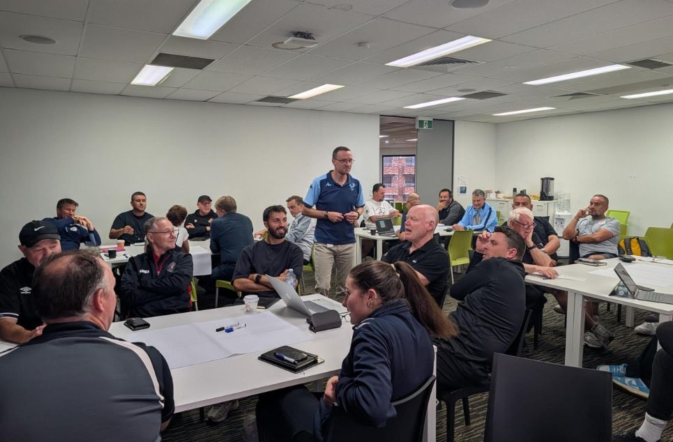 a group of people sitting at a table