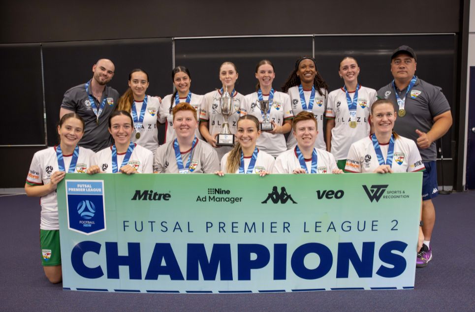 a group of people posing for the camera