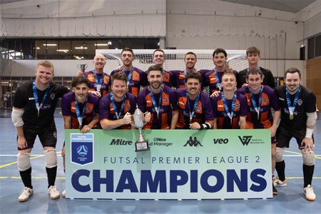 a group of people posing for the camera