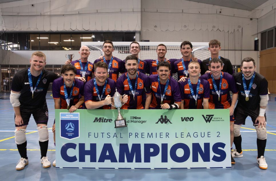 a group of people posing for the camera