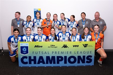 a group of people posing for the camera