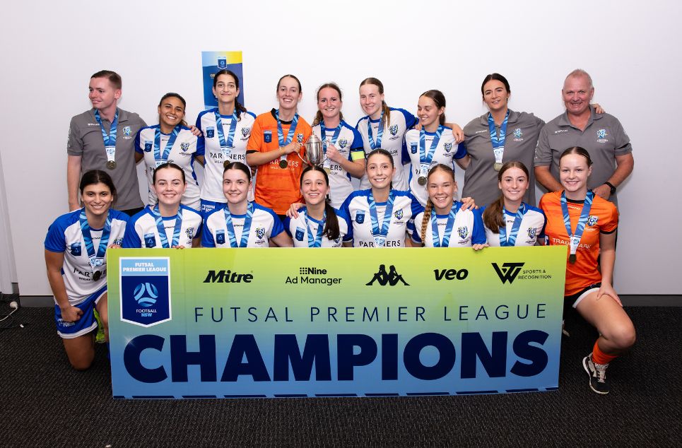 a group of people posing for the camera