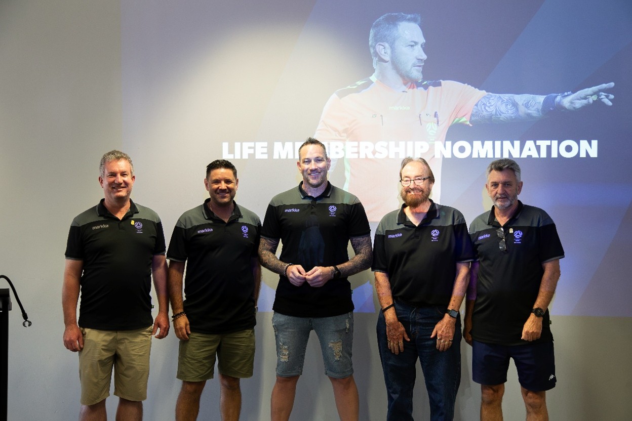 a group of people posing for a photo