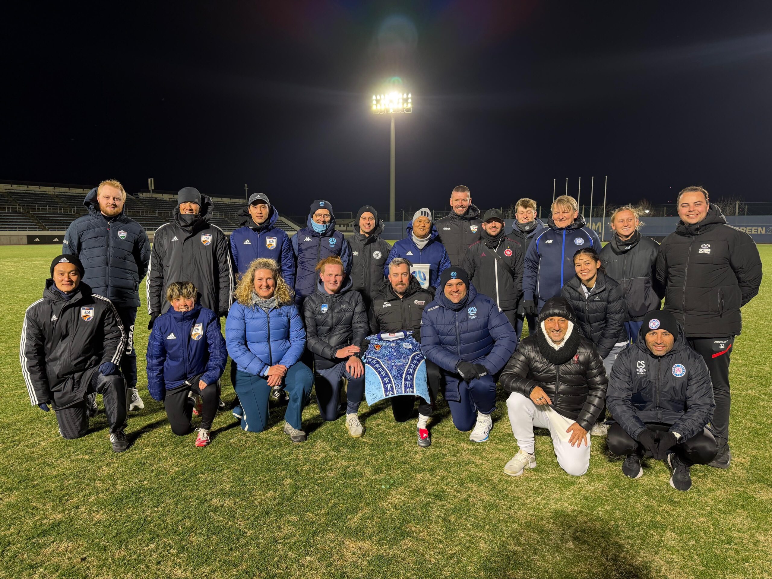 a group of people posing for the camera