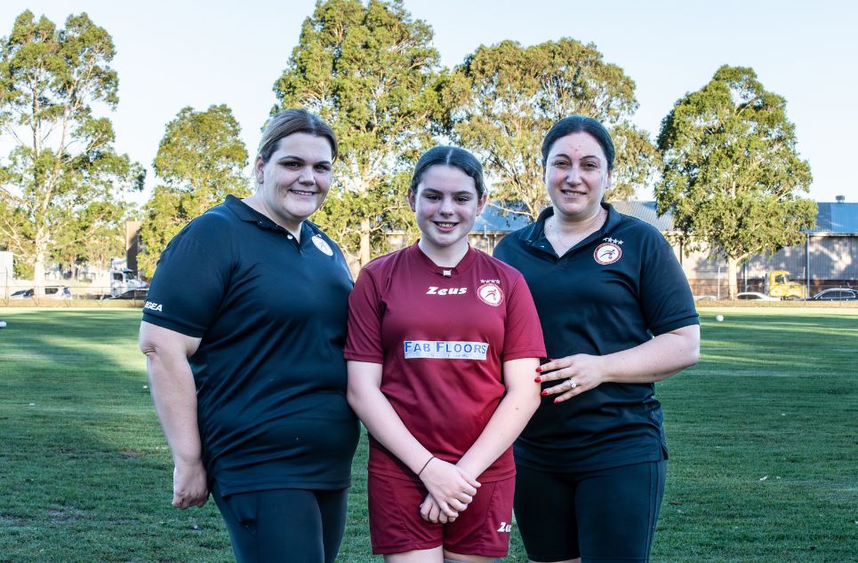 a group of people posing for the camera