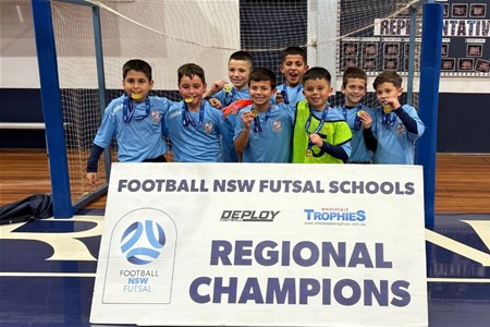 a group of people posing for the camera