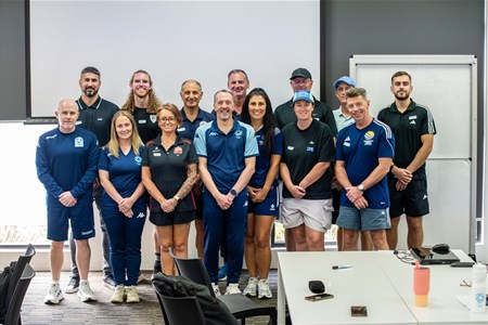 a group of people posing for a photo