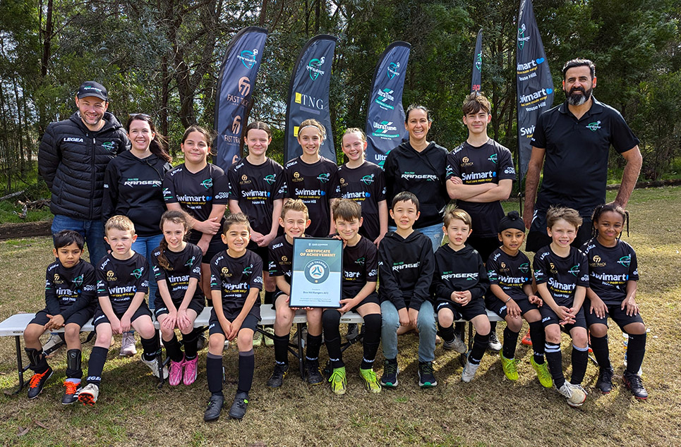 a group of people posing for a photo