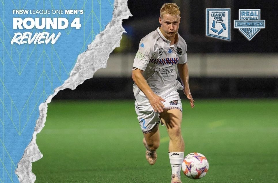 a man holding a football ball