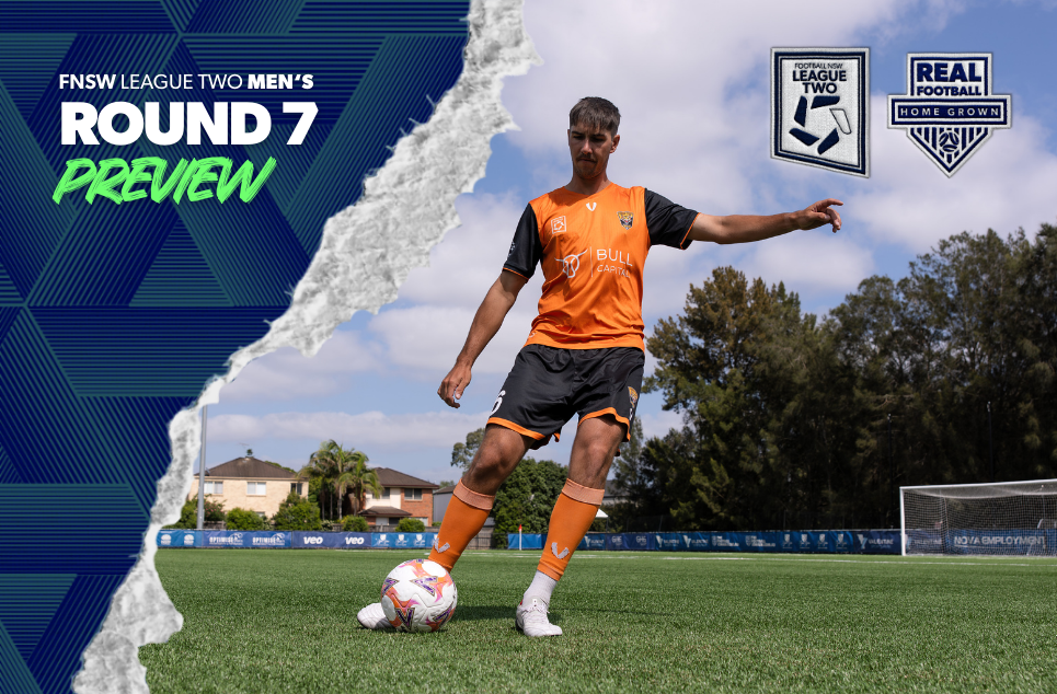 a man holding a football ball