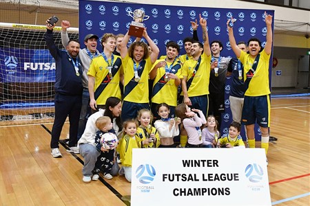 a group of people posing for the camera