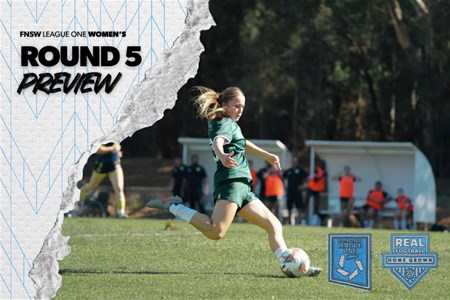 a girl holding a football ball