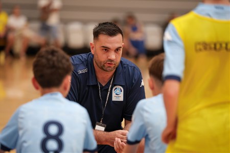 a man standing in front of a crowd