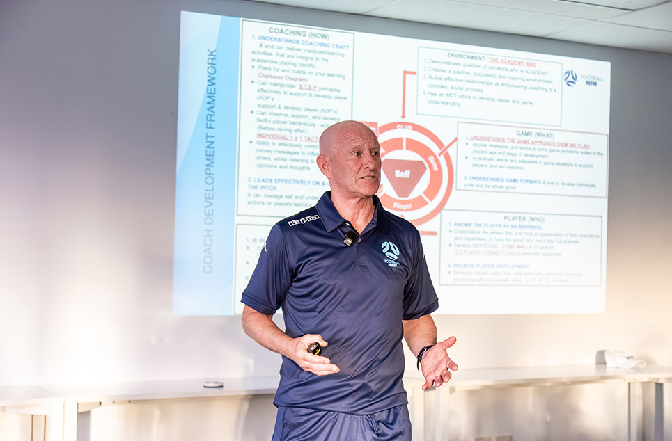 a person standing posing for the camera