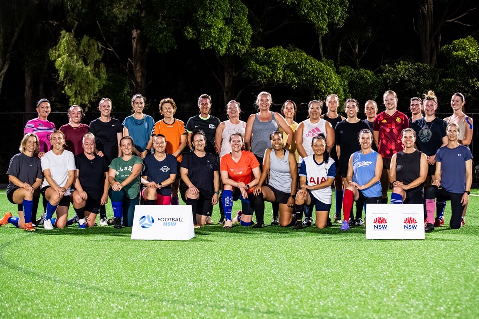 a group of people posing for a photo