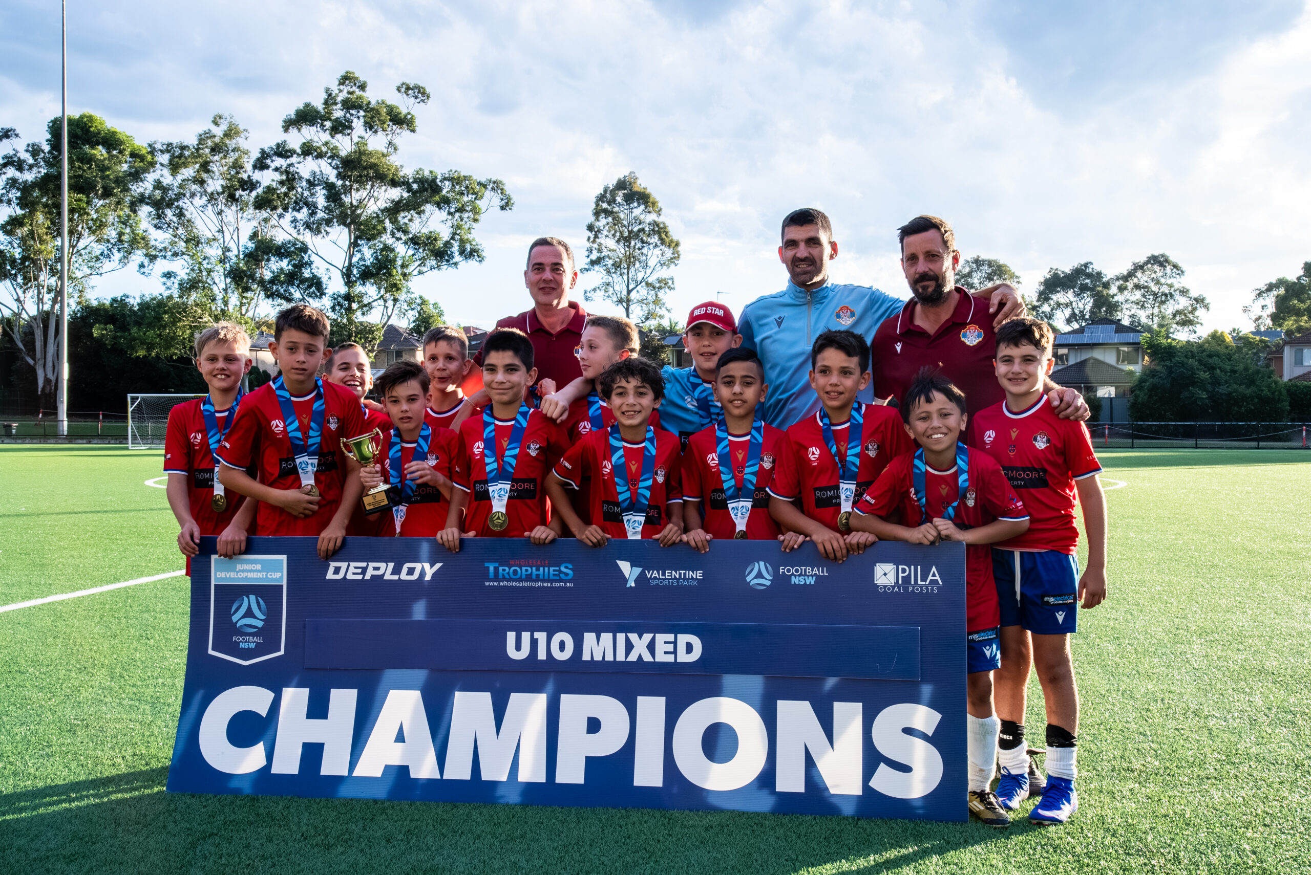 a group of people posing for a picture
