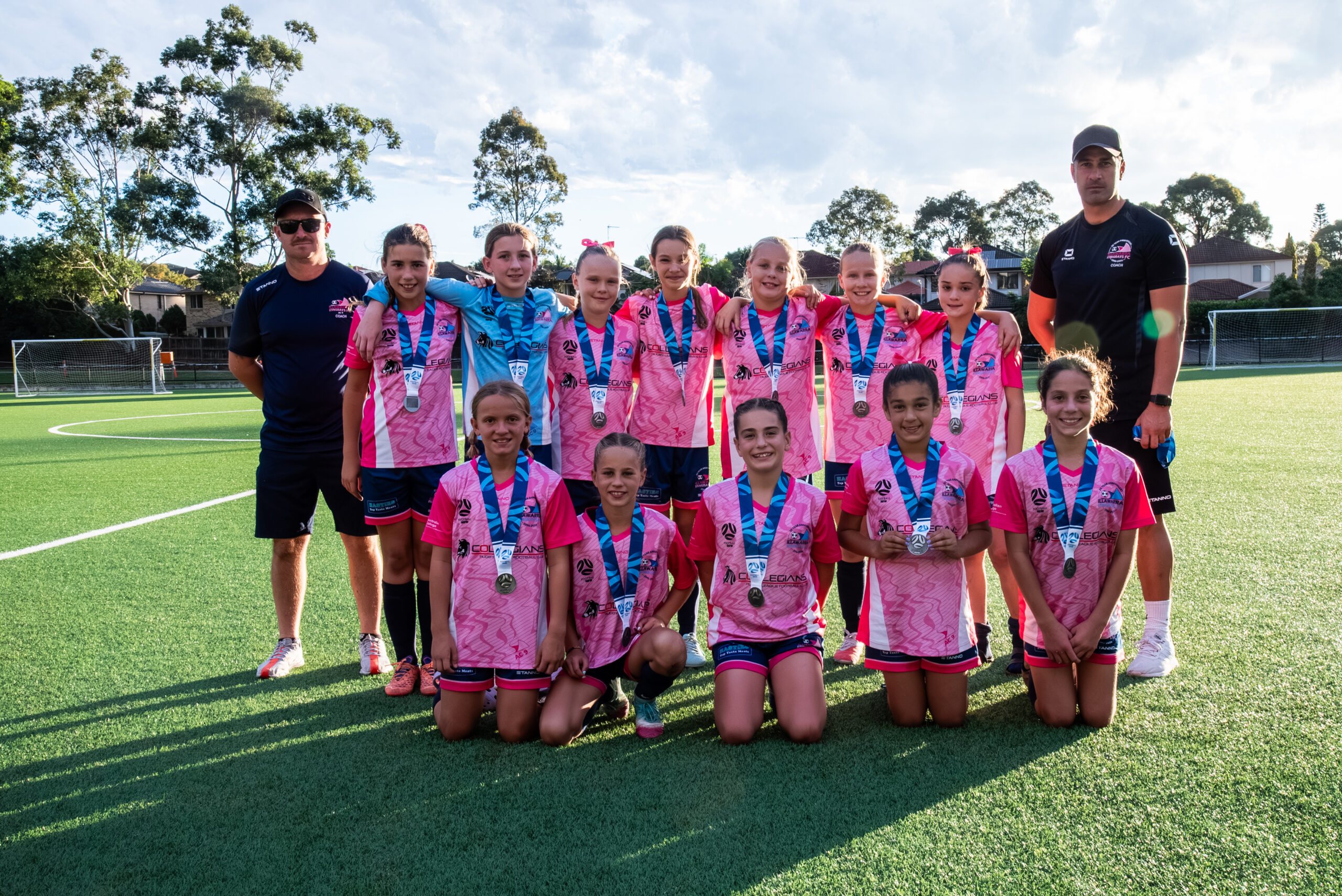 a group of people posing for a photo