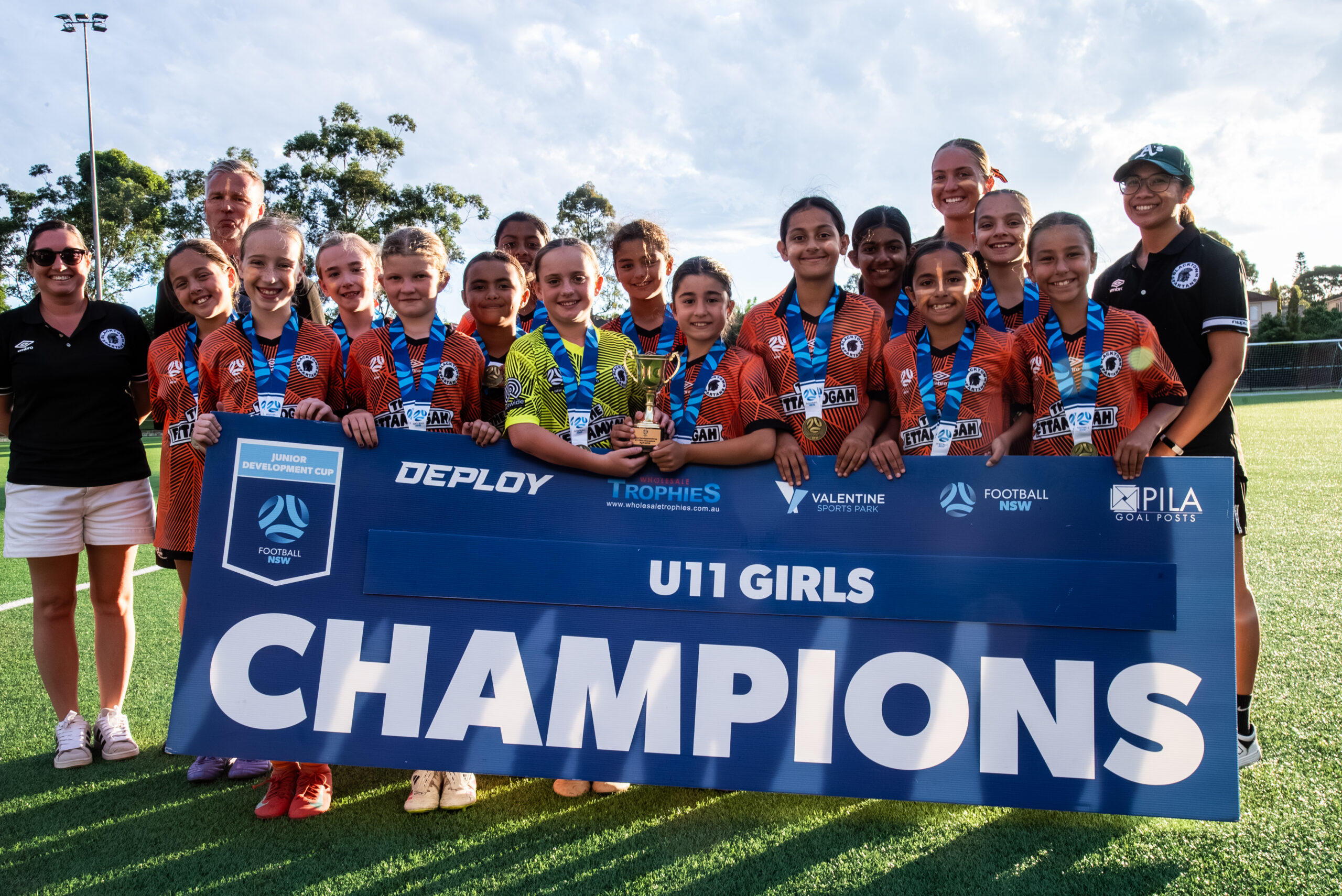 a group of people posing for the camera