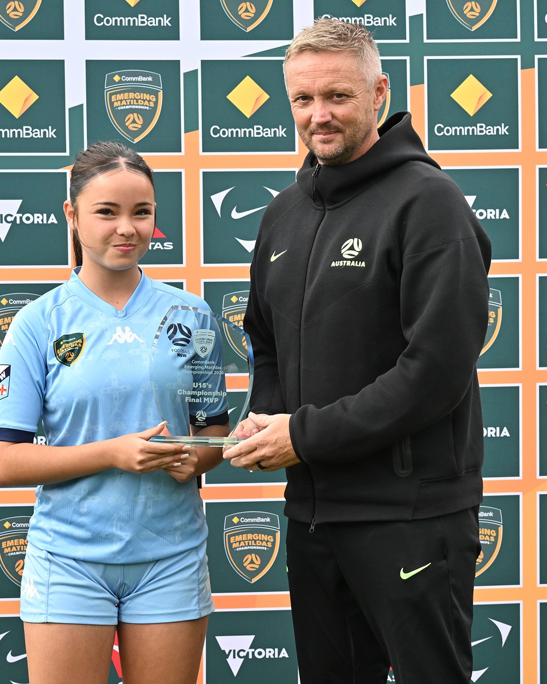 a group of people posing for the camera