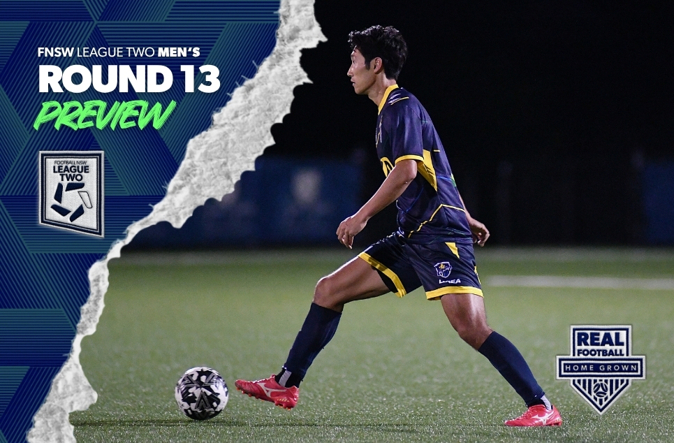 a man holding a football ball