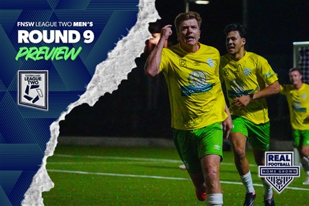 a man holding a football ball