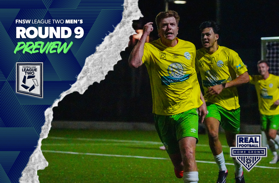 a man holding a football ball