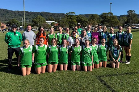 a group of people posing for a photo