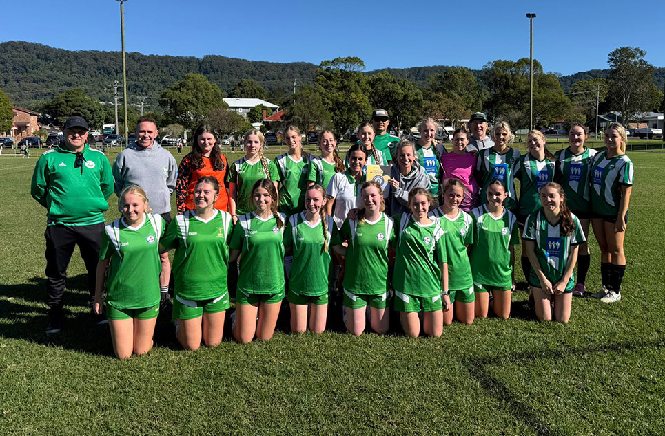 a group of people posing for a photo