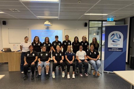 a group of people posing for the camera