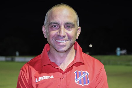 a man smiling for the camera